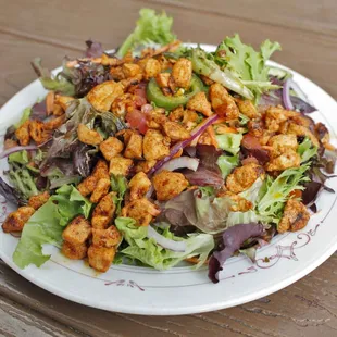 Salad with salmon tibs.