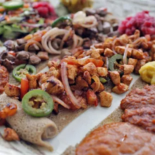 Family style platter with meat and vegetables.