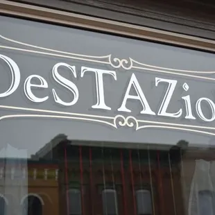 a reflection of a building in the window