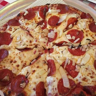 Pepperoni and onion pizza