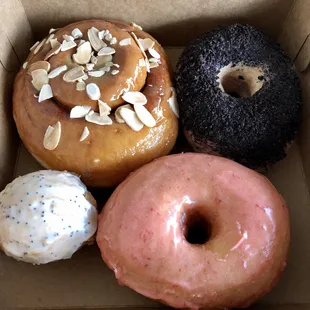 a variety of doughnuts in a box