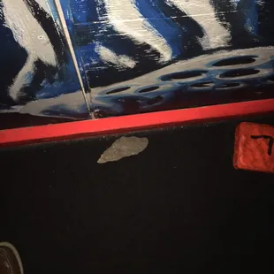 A rock my sister tripped over in this dark room. (Had to utilize flash to get it.