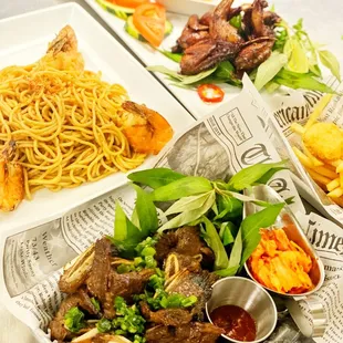 Korean short ribs, jumbo shrimps garlic noodles, quail with sticky rice