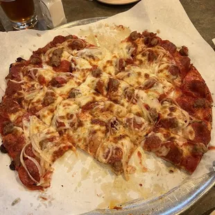 The pizza, thin crust