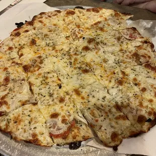 a whole pizza on a platter