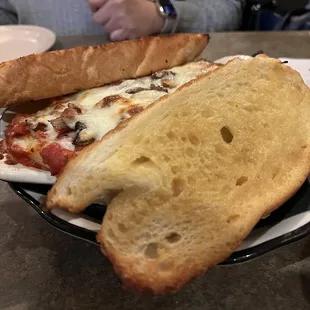 a plate of bread and a sandwich