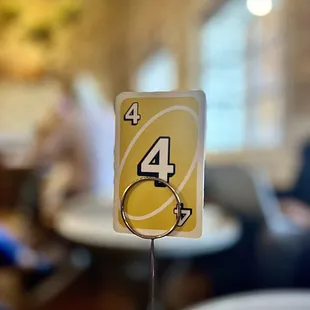 An UNO card used to display our order. Your drinks are brought to your table.