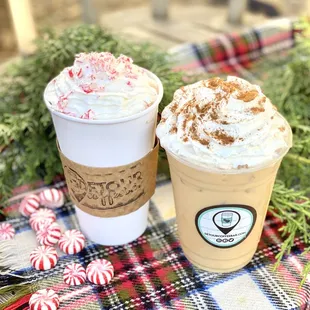 two cups of coffee on a plaid tablecloth