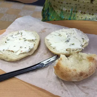 Asiago bagel with jalapeño cream cheese and half a bialys bagel.
