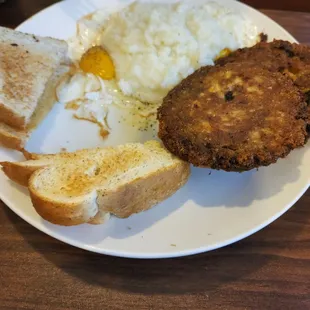 Salmon croquettes with Sunnyside up eggs