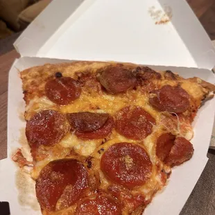 Pepperoni pizza at the corners