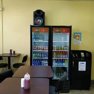 a table and chairs in a restaurant