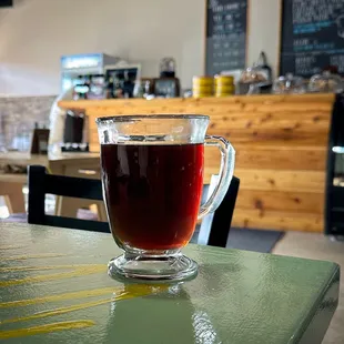 a cup of coffee on a table