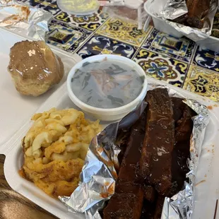 Rib dinner with collard greens, mac &amp; cheese, and cornbread. AND IT'S ALL HOT.