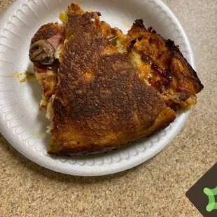 Burnt stiff pizza