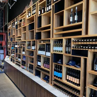 shelves of wine in a wine shop