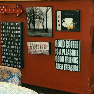 a coffee shop with posters on the wall
