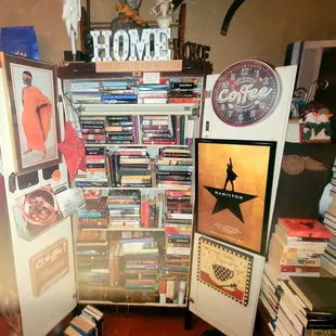 a room full of books and memorabilia