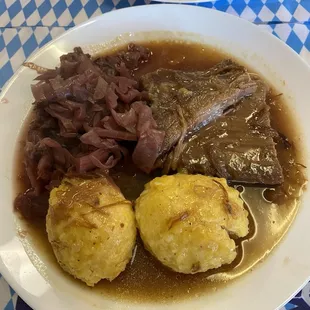 Sauerbraten, potato dumplings and red cabbage