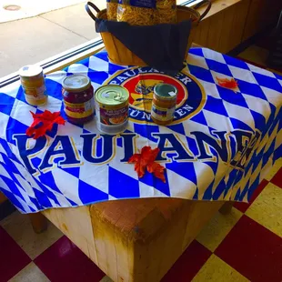 a table with a blue and white checkered table cloth