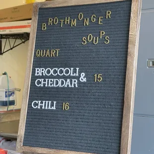 a sign for broccoli and cheddar chili