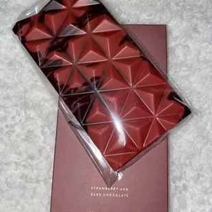 a chocolate bar wrapped in plastic