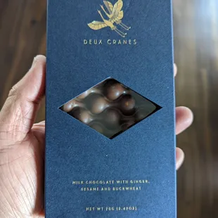 Milk chocolate with ginger,  sesame,  in buckwheat