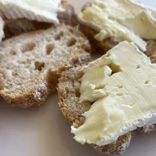 a plate of bread with butter