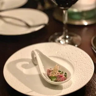 On the house pre-appetizer appetizer. I think it was some sort of steak tartare. Very good.