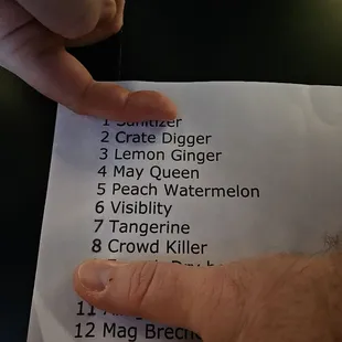 a person holding a piece of paper