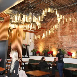 Deviation Distilling had a warm and inviting ambience with exposed brick, copper and barrel accents, and amazing bottle lighting.