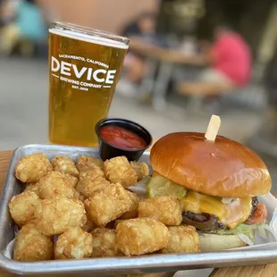 a burger and tater tots