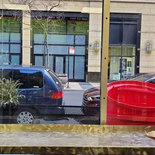 a view of a parking lot through a window