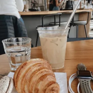 a croissant and iced coffee