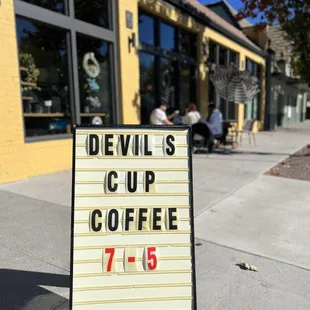 Hours and outside sign