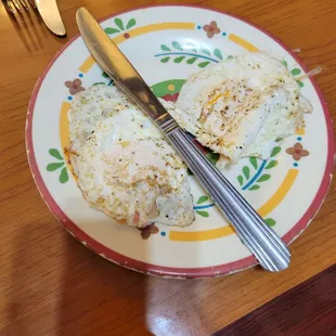 Over easy eggs on the side