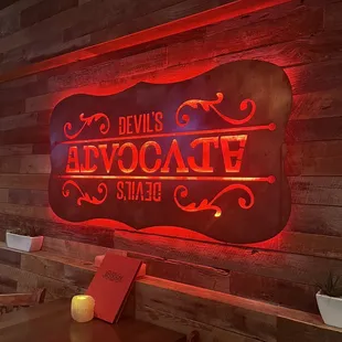 a red neon sign in a restaurant