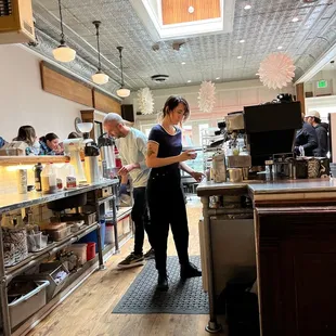 a waitress serving customers