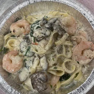 Spinach mushroom shrimp Alfredo with fettuccine.