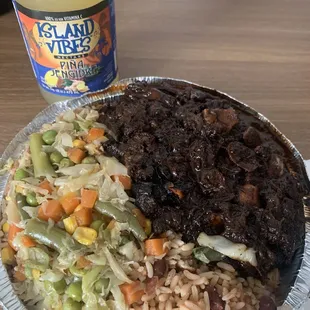 Large Oxtail with rice and beans and Stewed veggie.