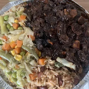 a plate of food with rice and beans