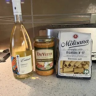 Sicilian Wine, bronze cut Rigatoni and DeVitis sauce.