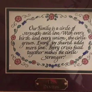 a framed picture of a quote