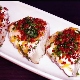 three slices of pizza on a plate