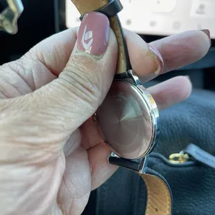 Damage to watch. Need to zoom in to see the gouging.
