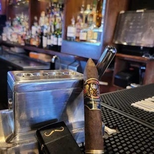 a cigar on a bar