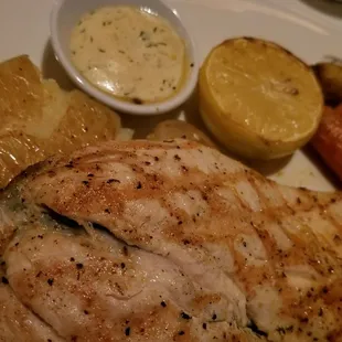 Wood-grilled boneless rainbow trout, perfectly moist and delicious.