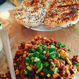 Yum--sesame bread pockets with pork and tofu