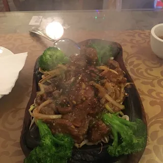 56. Sizzling Garlic Lamb