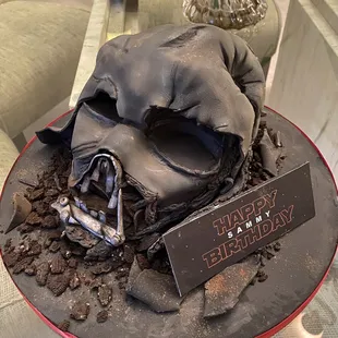a chocolate cake with a skull on it